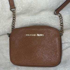 Micheal Kors cross body clutch